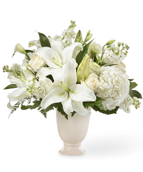 All White Flowers in a Ceramic Vase