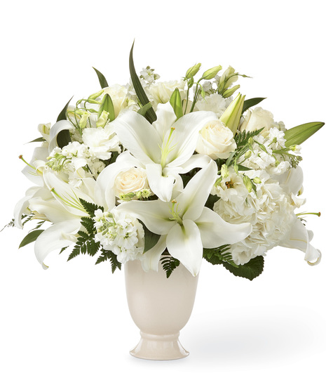 All White Flowers in a Ceramic Vase