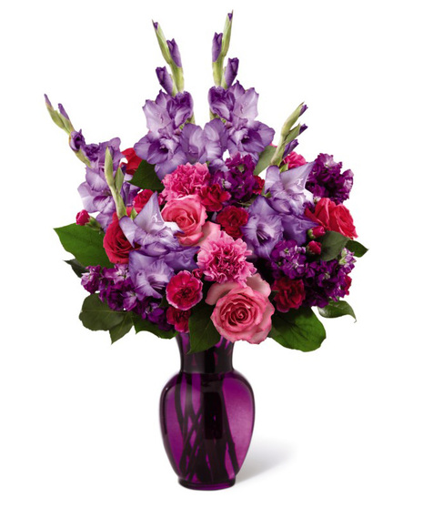 Pink and Purple Flowers in a Tinted Glass Vase