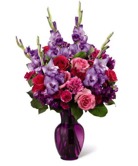 Pink and Purple Flowers in a Tinted Glass Vase