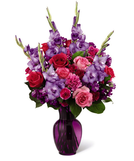 Pink and Purple Flowers in a Tinted Glass Vase