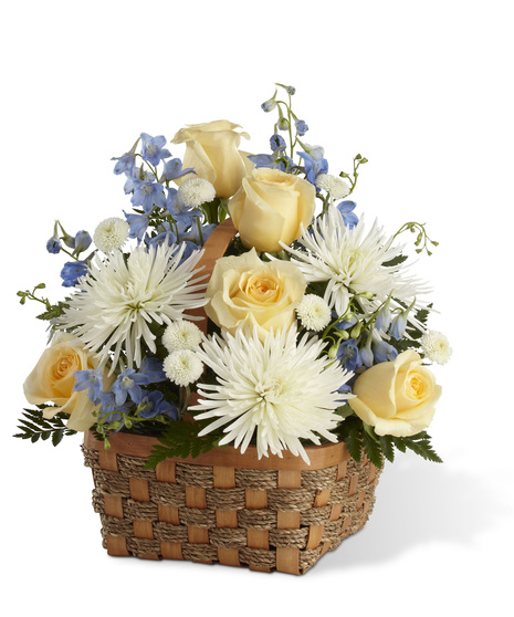 White, Blue and Cream Flowers in a Handled Basket