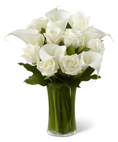 White Roses and White Calla Lilies in a Glass Vase