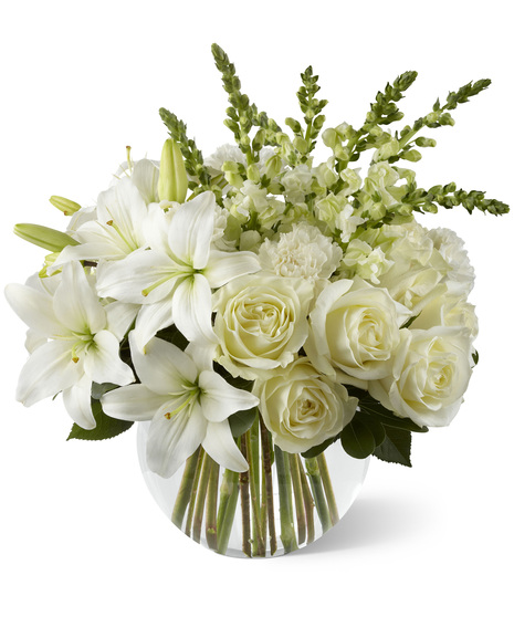 White Sympathy Flowers in a Glass Bowl
