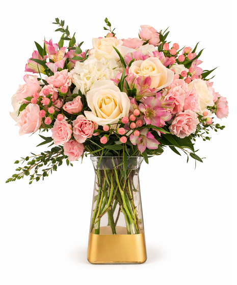 Hydrangea and rose bouquet in a designer glass vase