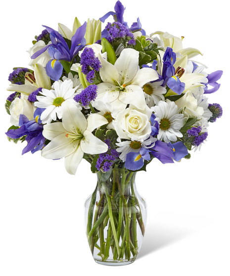White and Purple Flowers in a Glass Vase