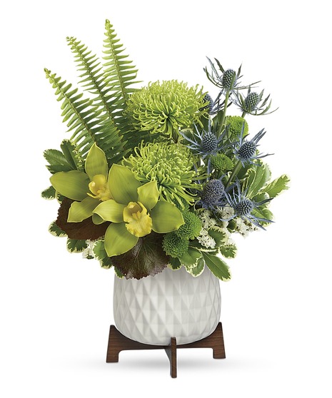 Green Flowers and Orchids in Contemporary Vase