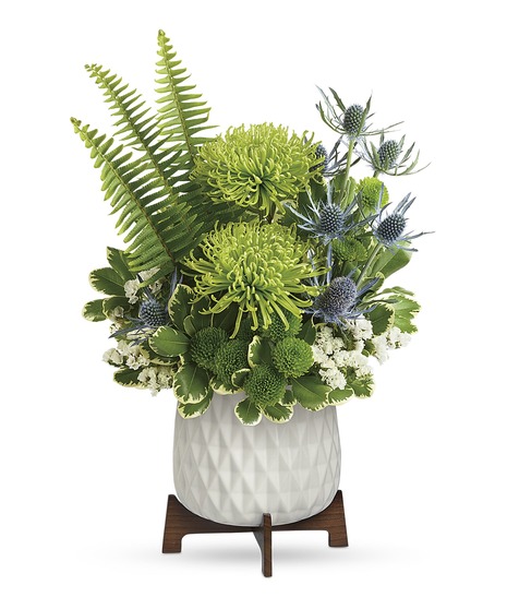 Green Flowers and Orchids in Contemporary Vase