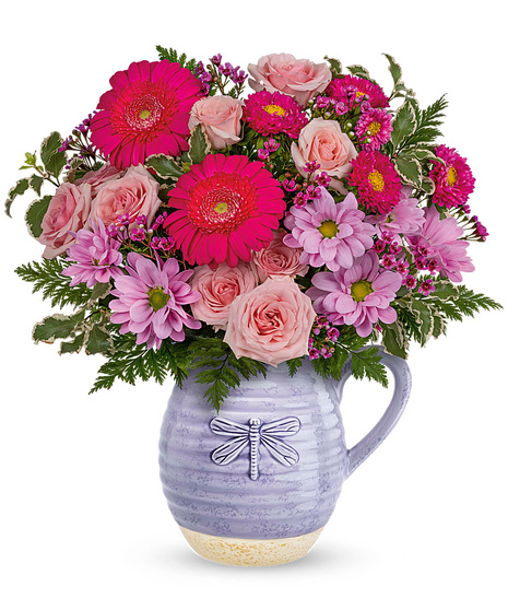 Lavender floral bouquet in a resuable pitcher with dragonfly design