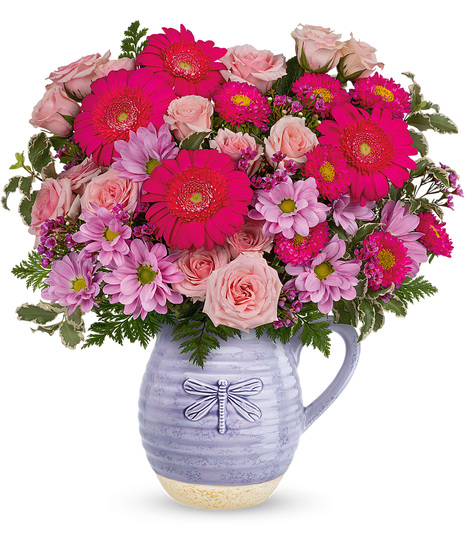 Lavender floral bouquet in a resuable pitcher with dragonfly design