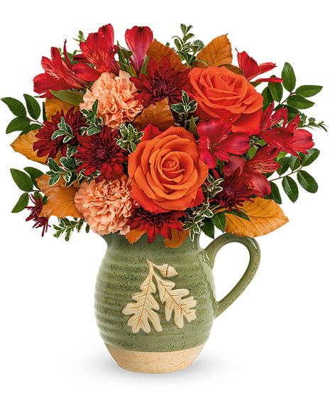 Autumn flowers in a food safe pitcher