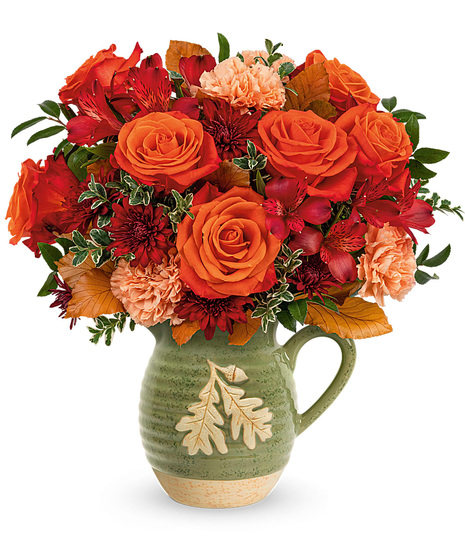 Autumn flowers in a food safe pitcher