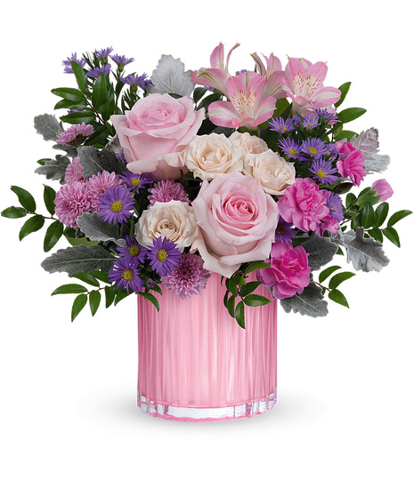 Pink flowers in a pearlescent pink vase for Mother's Day