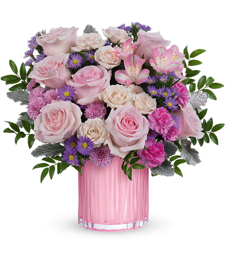 Pink flowers in a pearlescent pink vase for Mother's Day