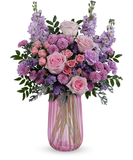 Pink and lavender flowers in a keepsake Iridescent Delight vase