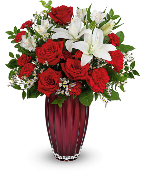 White and red flowers in a  Modern Devotion vase