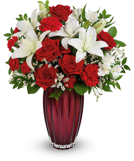 White and red flowers in a  Modern Devotion vase