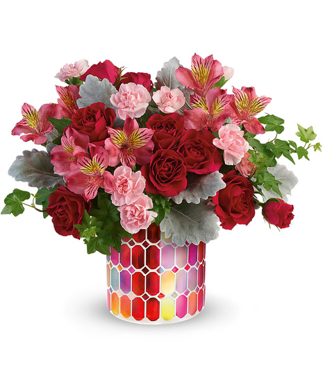 Assorted pink flowers in a Charming Mosaic cylinder