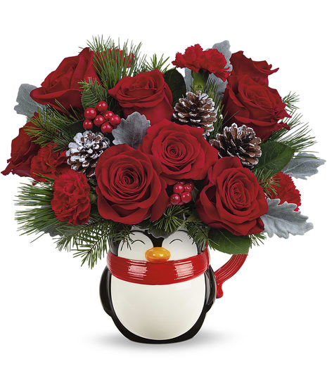 Christmas flowers in a ceramic penguin mug