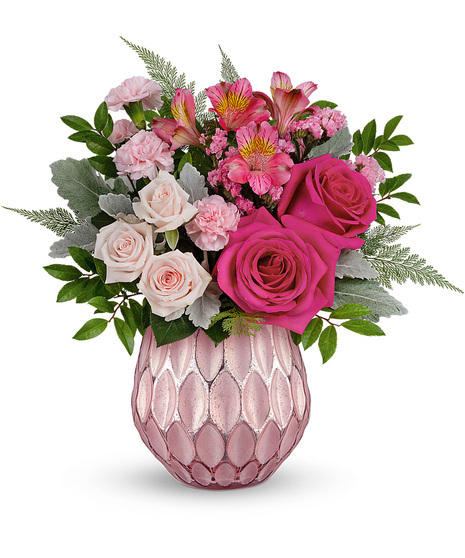 A pink Pretty Love Vase of pink flowers for Valentine's Day
