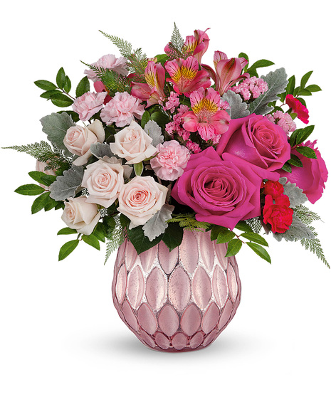 A pink Pretty Love Vase of pink flowers for Valentine's Day