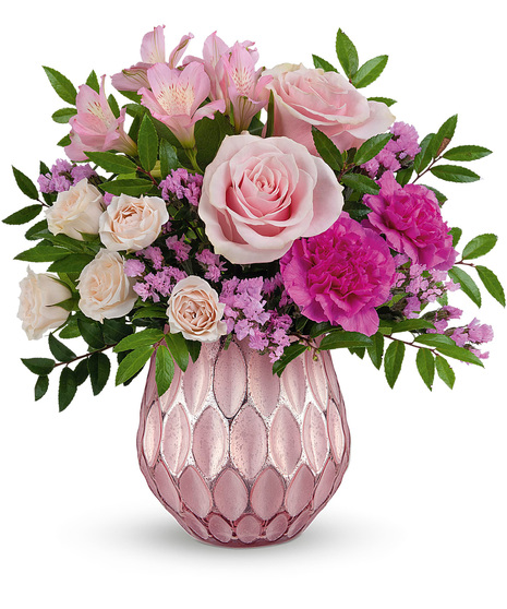 Pretty Valentine's Day flowers arranged in a pink vase