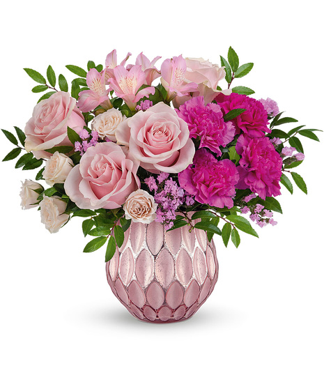 Pretty Valentine's Day flowers arranged in a pink vase