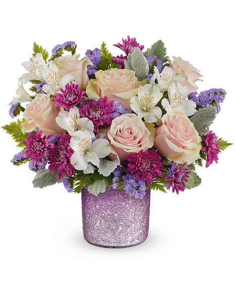 Mother's Day arrangement designed in a radiant reverie cylinder vase.