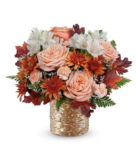 Sparkling Blooms Bouquet with orange roses, red alstroemeria, chrysanthemums, and autumn accents in a copper vase.