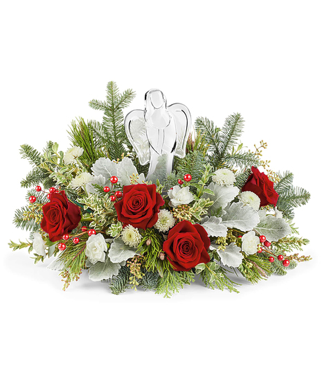 Joy to the World Bouquet with red roses, white carnations, button chrysanthemums, and winter greens surrounding a keepsake crystal angel.