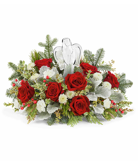 Joy to the World Bouquet with red roses, white carnations, button chrysanthemums, and winter greens surrounding a keepsake crystal angel.
