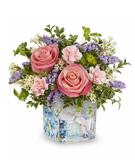 Whisper of Grace Bouquet with pink roses and pastel flowers arranged in a decorative glass cube with dove design