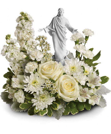White Sympathy Flowers with Jesus Sculpture Keepsake