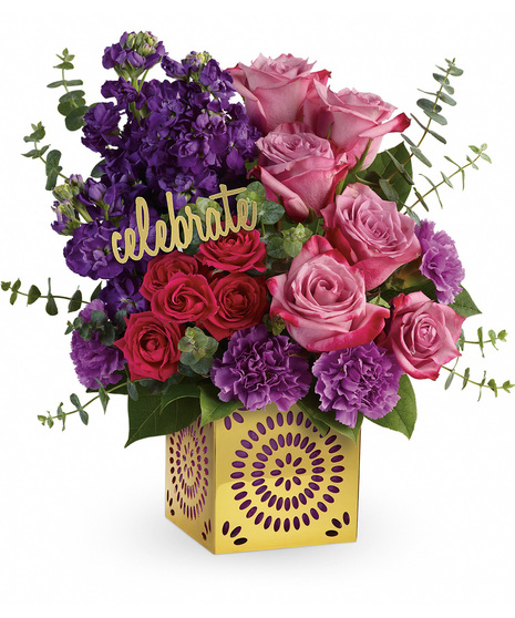 Bold flowers with a celebrate pic in a metallic cut out vase