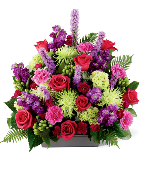 Green, Pink and Purple Funeral Flowers Arranged