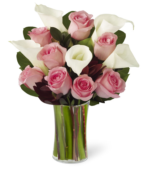 White Calla Lilies with Soft Pink Roses in a Glass Vase