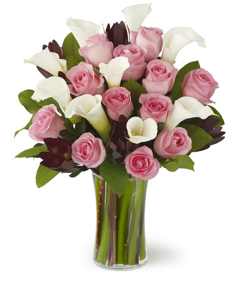 White Calla Lilies with Soft Pink Roses in a Glass Vase