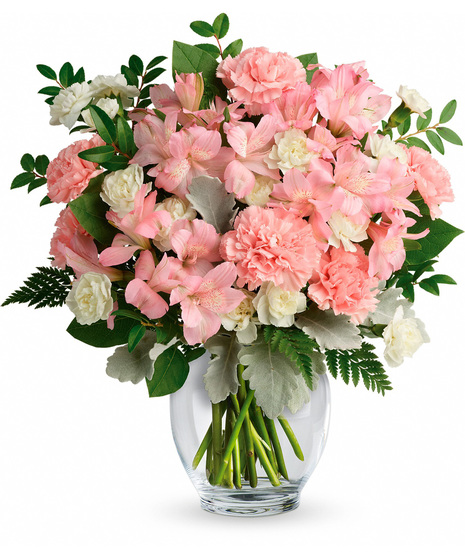 Pink and white flowers in a vase