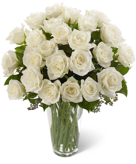 Clear glass vase of 12, 18 or 24 white roses