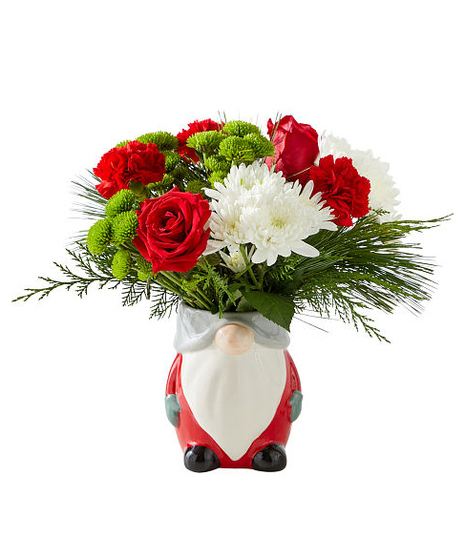 Ho Ho Gnome Bouquet with red roses, white chrysanthemums, green button mums, and evergreens arranged in a festive gnome vase.