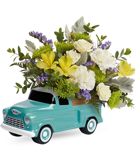 White rose bouquet arranged in a Chevy Pickup Keepsake